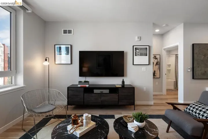 Living area with wood finished floors