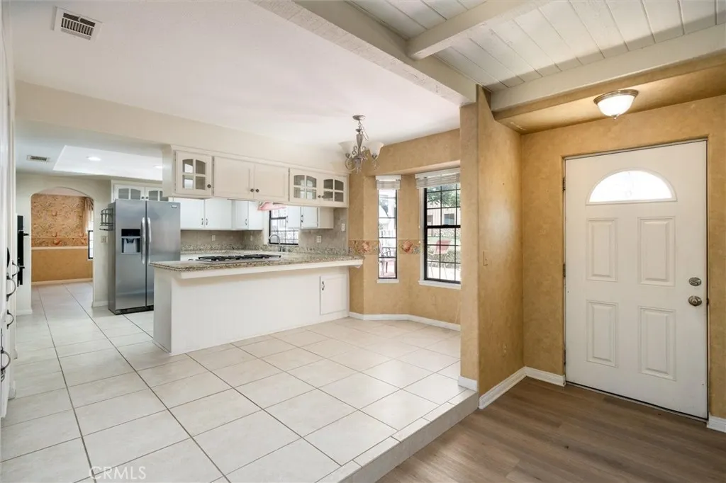 Kitchen and Nook.  Door to patio