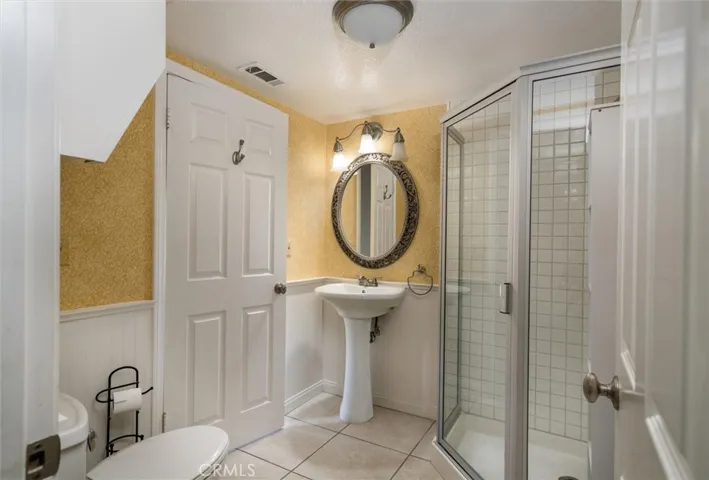 Downstairs bathroom with walk-in shower.