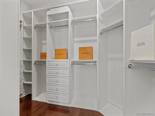 Nice built ins in walk in closet