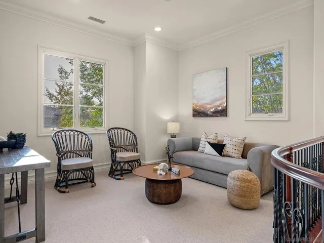 Convenient entertainer's loft can be a game room or additional family room .