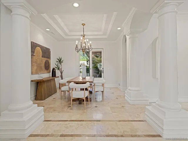 Dining room open to inviting entry