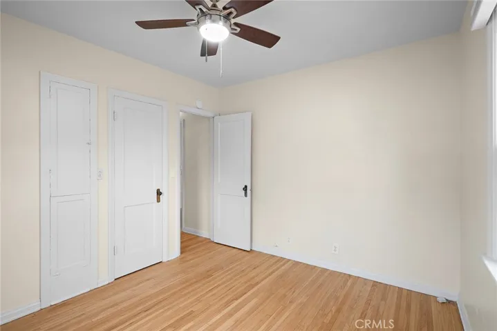 Bedroom 2 with hardwood floors