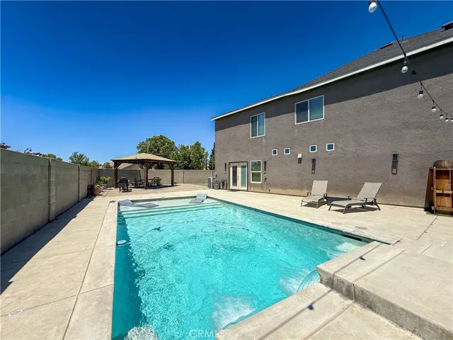 Pool and Left Side of Yard.