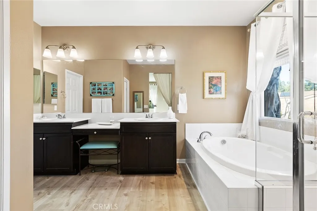 primary bathroom with huge walk-in closet