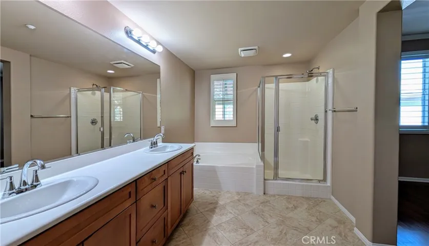 Primary bath with separate soaking tub and shower
