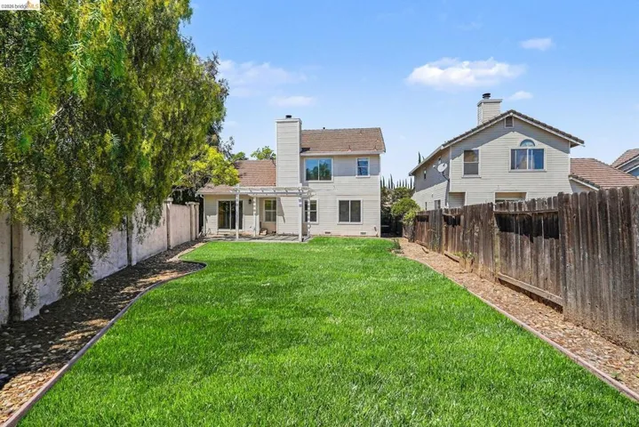 Digitally altered to depict a lawn in the backyard