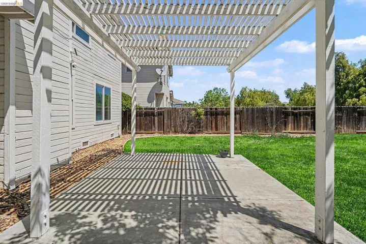 Digitally altered to depict a lawn in the backyard