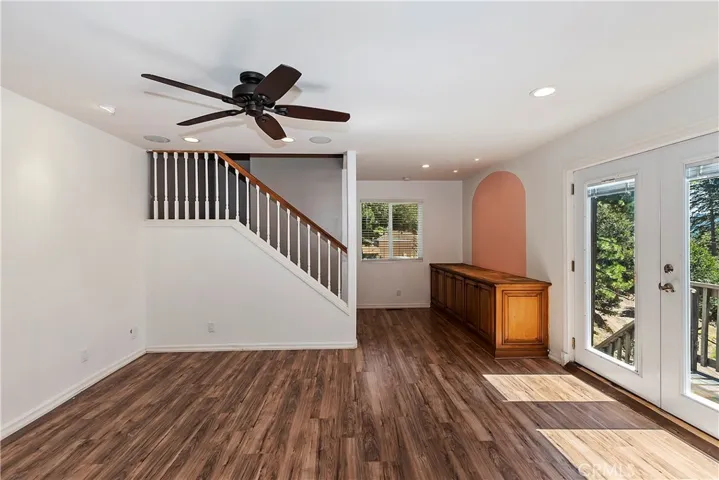 Dining room with back staircase and French door
