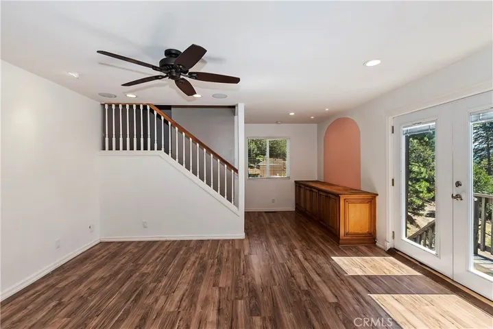 Dining room with back staircase and French door
