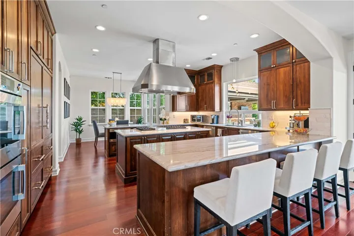 Chef's Kitchen with 3 Stone Island Counters