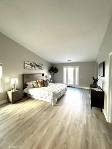 Master bedroom with private bathroom, shower and sunk in tub.