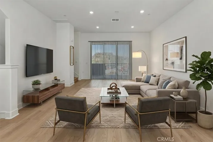 VIRTUALLY STAGED TO SEE WHAT IT COULD LOOK LIKE WITH FURNITURE IN IT