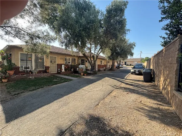3 units together.  The back house is separate with a large back yard