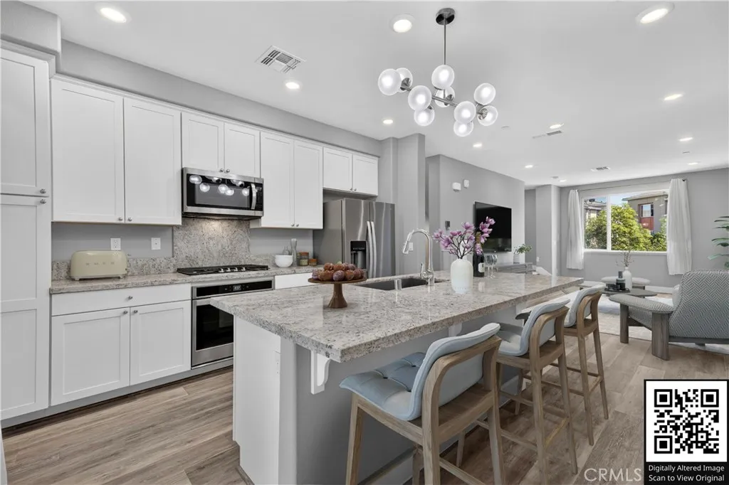 Kitchen and Living Room (Virtually staged)