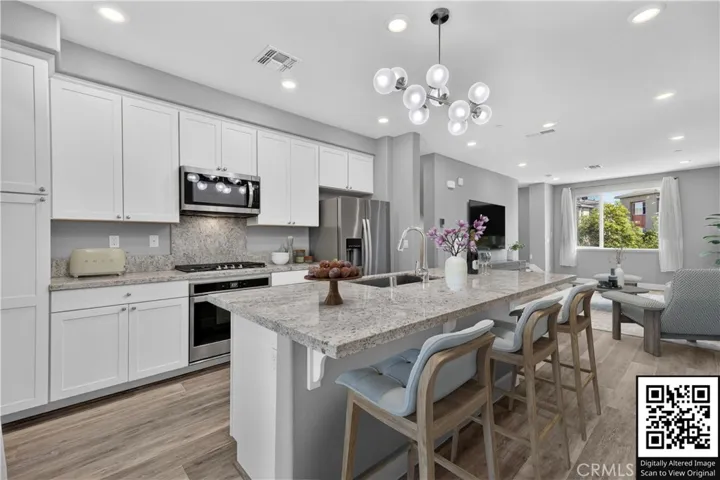 Kitchen and Living Room (Virtually staged)