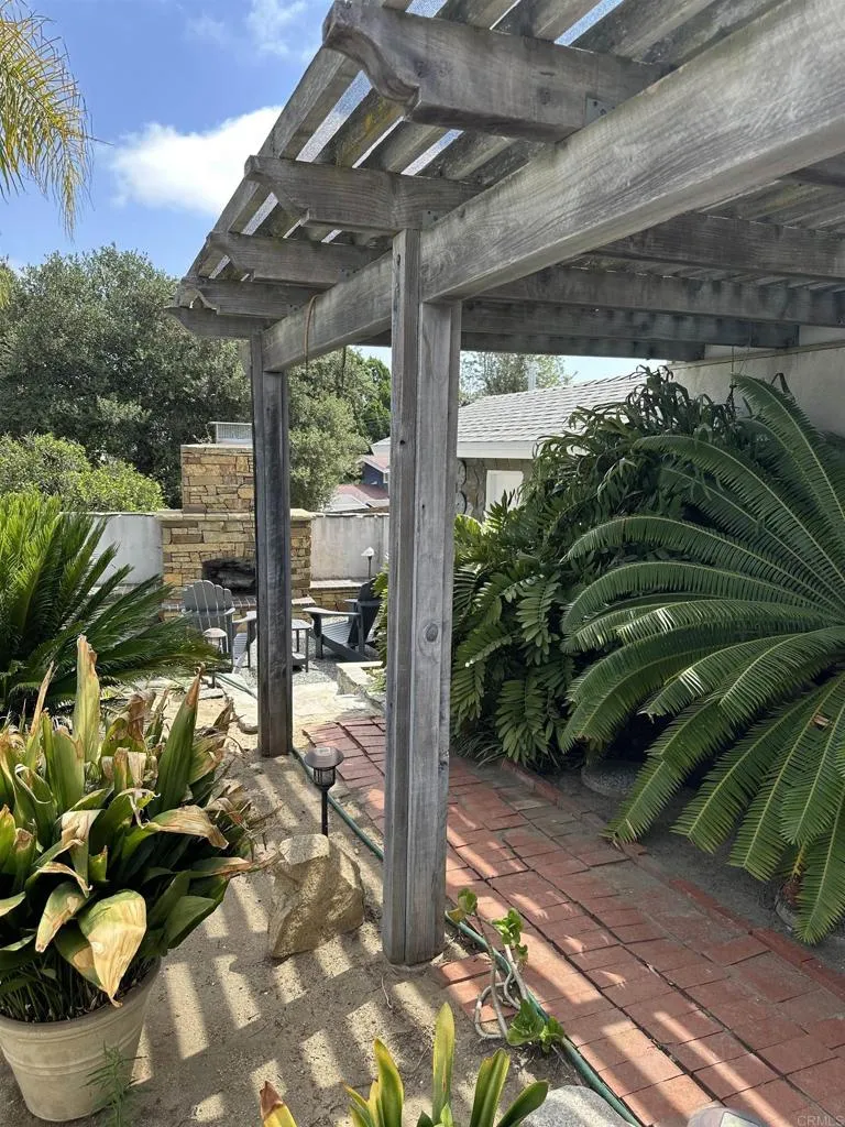 outdoor fireplace next to Cabana