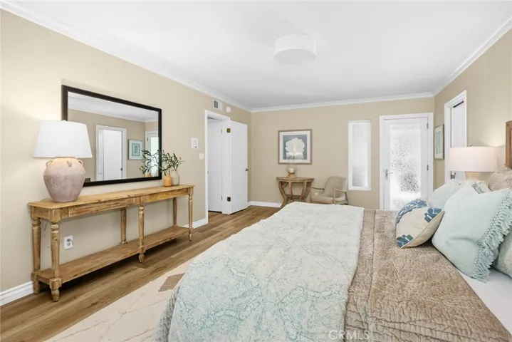 Primary Bedroom - looking towards rear patio door entry