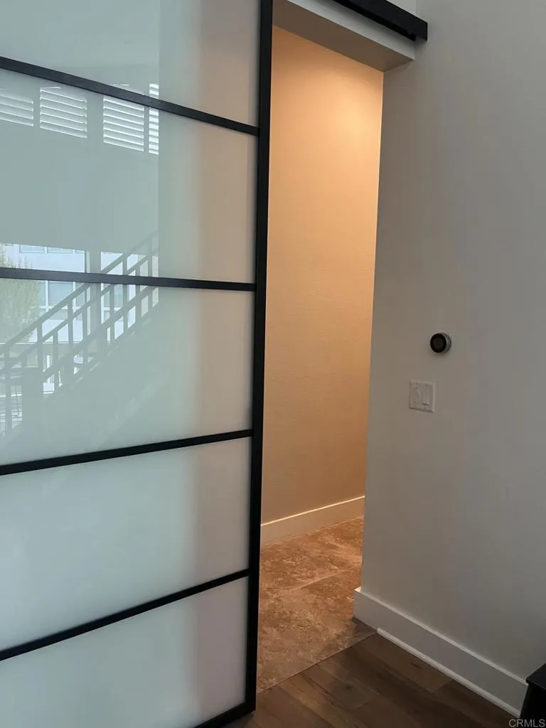 Hidden behind these elegant doors - is the laundry and utility corridor!
