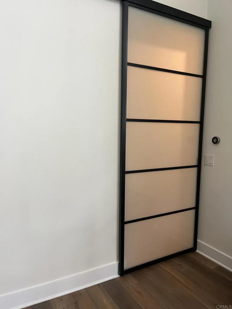 Hidden behind these elegant doors - is the laundry and utility corridor!