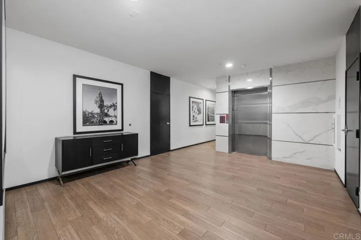 View of the lobby with elevator conveniently located beside the garage.