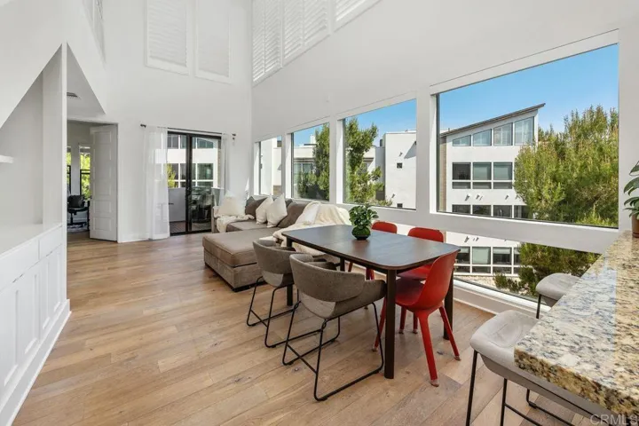 View of the Great Room from kitchen with a balcony beyond - perfect for barbecuing!