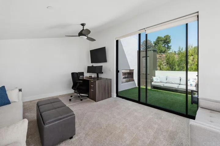 Family Room/Office - this spacious room leads out to the large entertainment deck with fireplace.