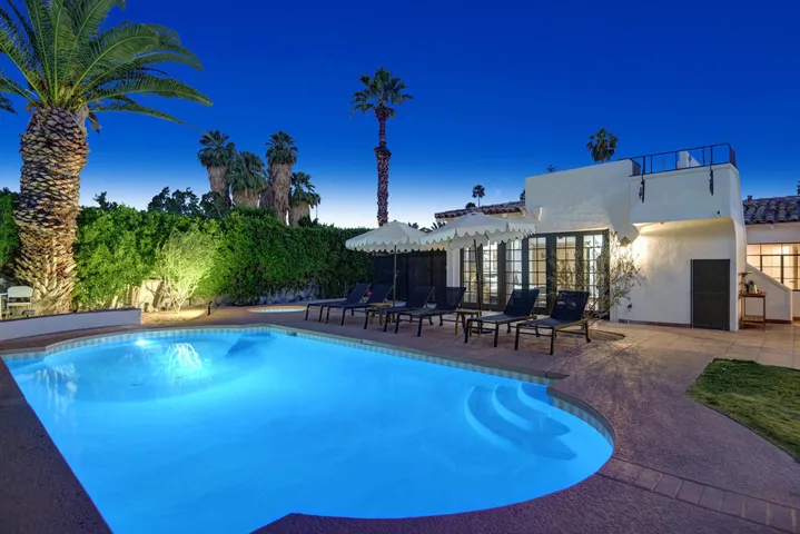 POOL AND SPA TO BACK OF HOUSE NIGHT MLS