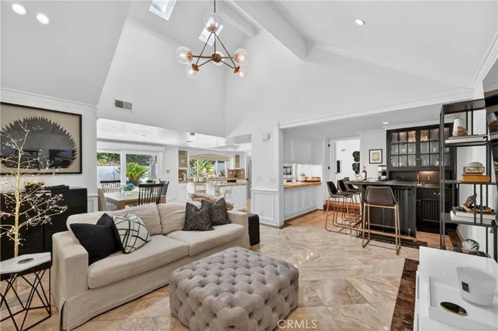 Family room looking into kitchen and wet bar