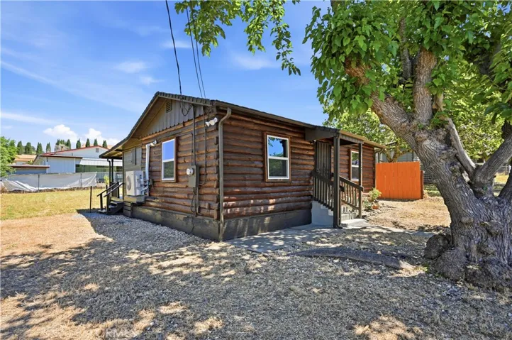 Exterior of home. There is a vacant lot next to this property on the left side