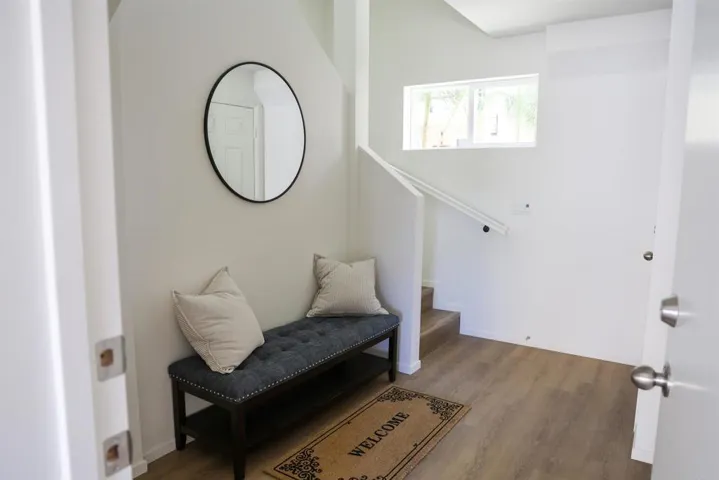 Entry area with adjacent living space and interior access