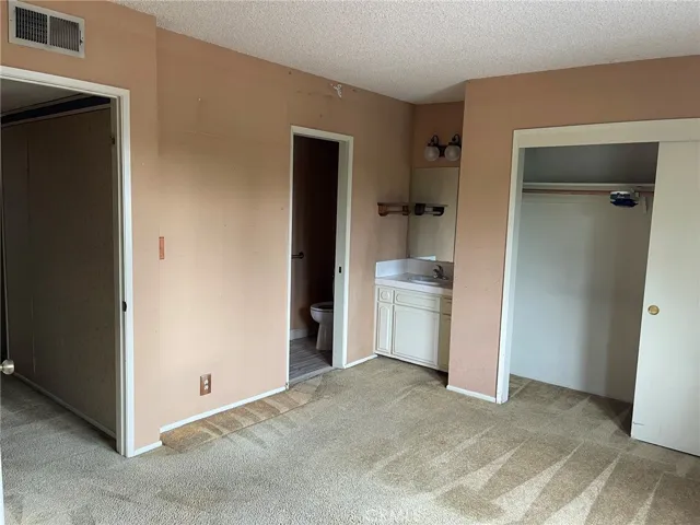 Master bedroom with bathroom entrry