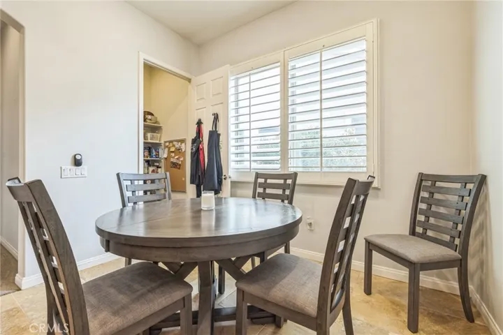 The walk-in pantry is in the kitchen dining area.