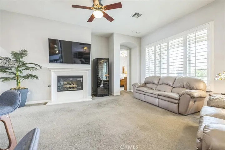 Pretty plantation shutters on every window.