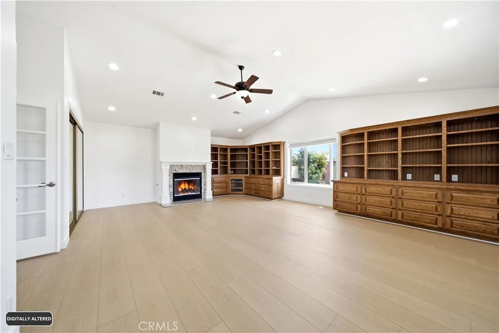 Primary Bedroom w/ Gas Fireplace & 2 Closets