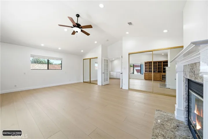 Primary Bedroom w/ Gas Fireplace & 2 Closets