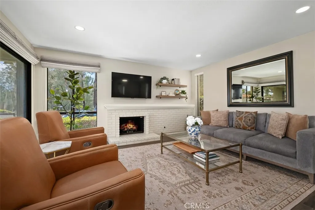 Virtually staged fire in the fireplace.
