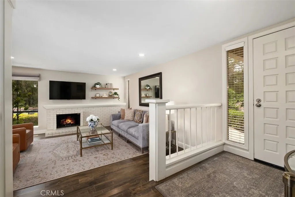 Virtually staged fire in the fireplace.