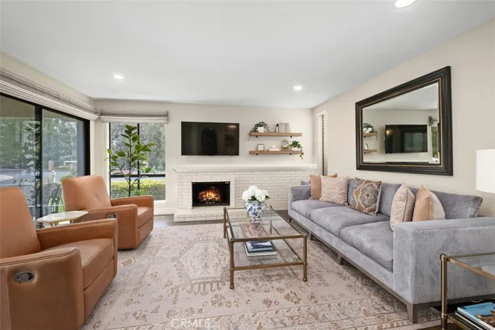 Virtually staged fire in the fireplace.