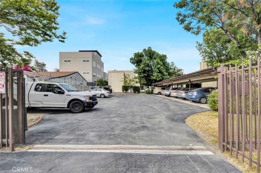 Gate #2, directly in front of the building for unit #43. Located on the WEST side of Runnymede.