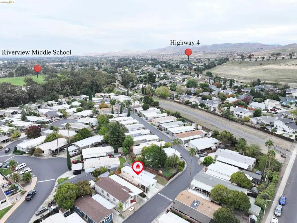 Aerial perspective of suburban area with mountains