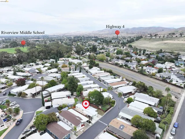Aerial perspective of suburban area with mountains