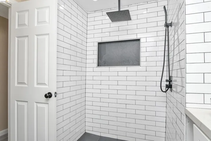 Bathroom with tiled shower