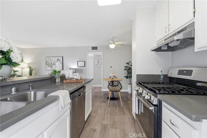 Kitchen with stainless steel appliances.