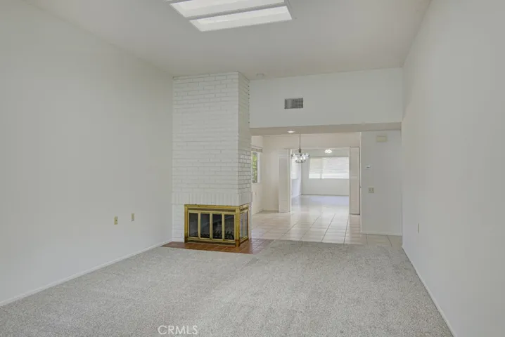Another view of the living room looking back towards the dining room and bonus room in the background.