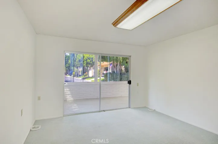 Another view of the left-side primary bedroom.