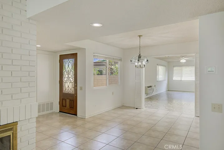 Entry to the residence and the dining area. The bonus room is in the background.