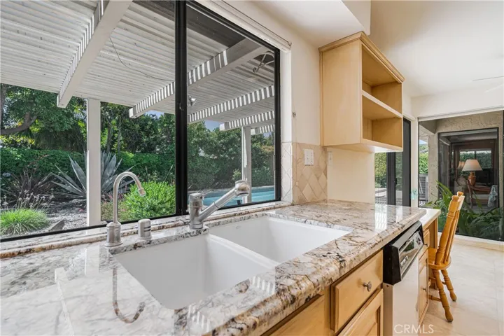 Desk in Kitchen & View to Breakfast Area