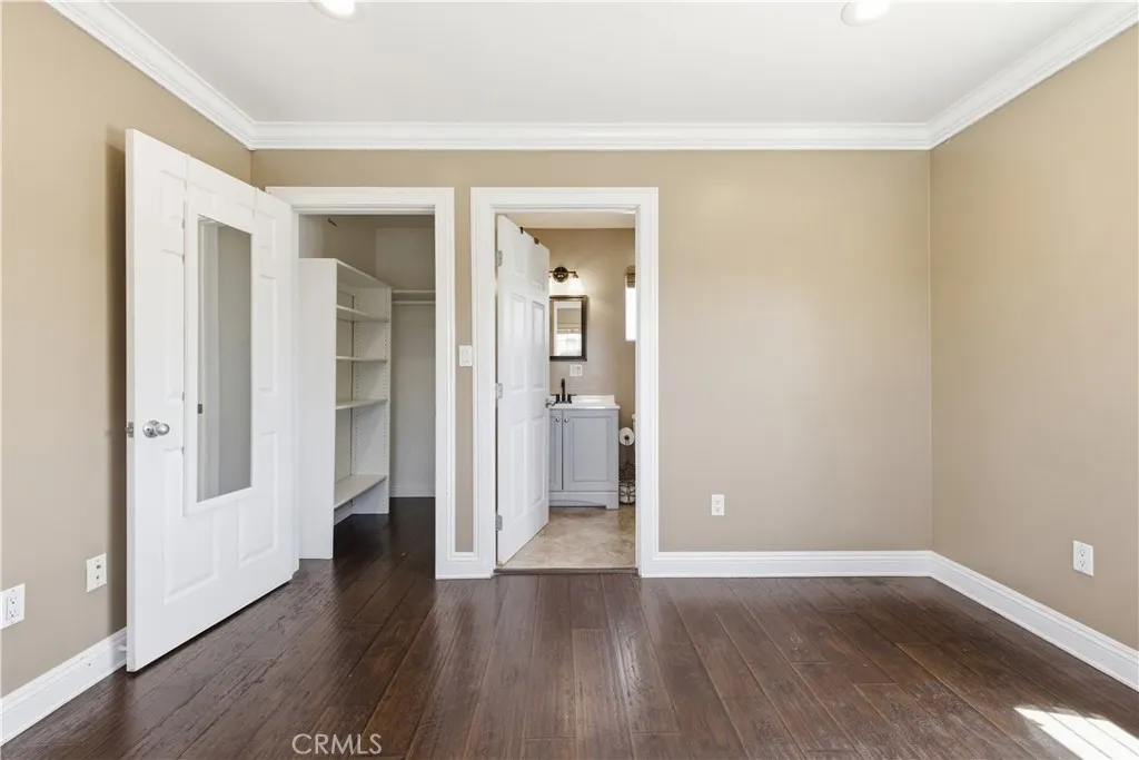 Primary Bedroom with walk in closet and bathroom attached