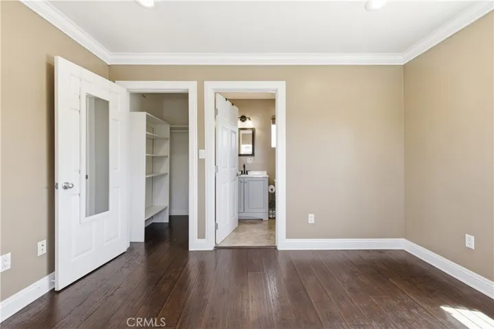 Primary Bedroom with walk in closet and bathroom attached